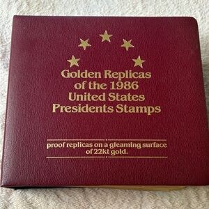 Complete set of golden replicas of US presidents stamps